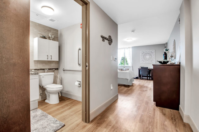 Studio room view with bedroom and bathroom